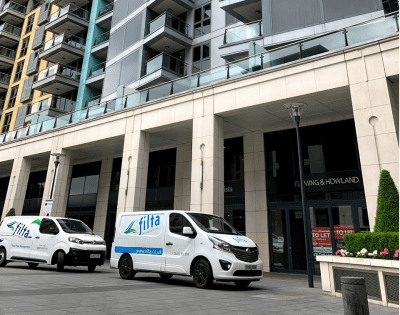 Vans outside Arrow office (cropped) Filta Vans outside Arrow office | Filta Environmental