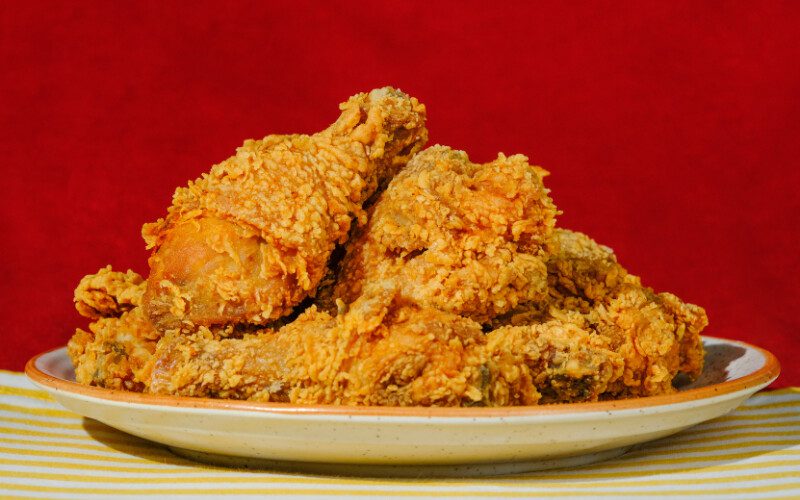 Image of fried chicken on a white plate